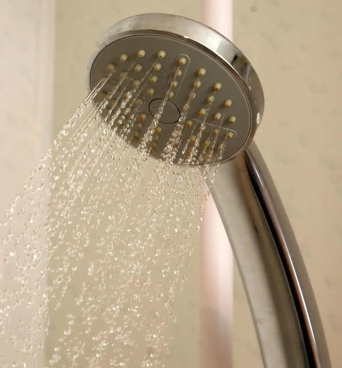 Running shower head in a Nottingham bathroom